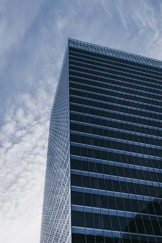 office building high rise building under white sky city
